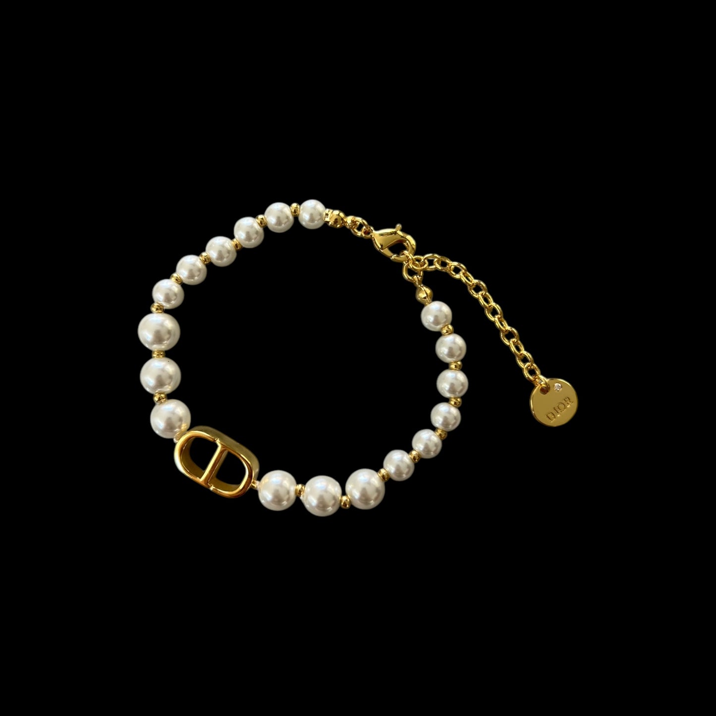 Pulsera CD perlas y metal dorado