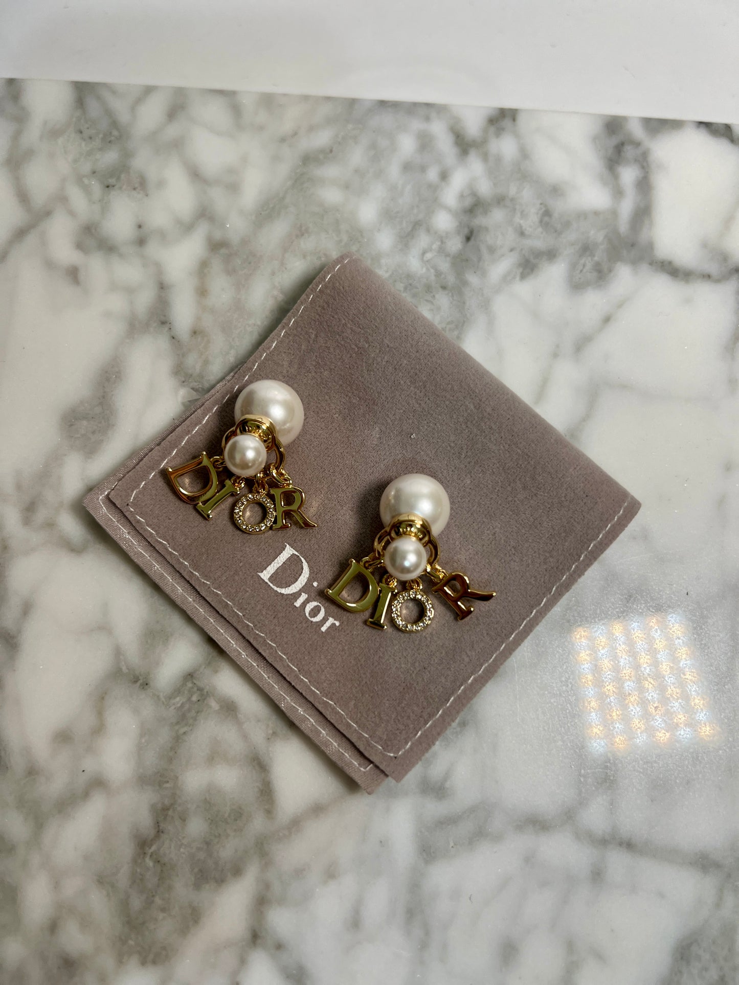 Aretes Dior colgante