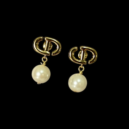 Aretes CD perla colgante